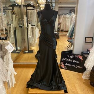 Silky black prom dress with open back
